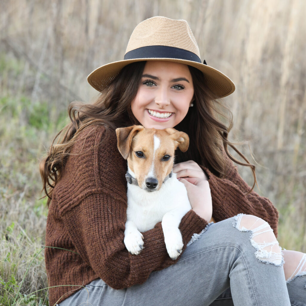 Portrait of a confident tween girl smiling during a 'Bloom Your Own Way' photo session. The image captures her radiant personality and self-assuredness, highlighting the beauty of celebrating individuality and inner strength before middle school