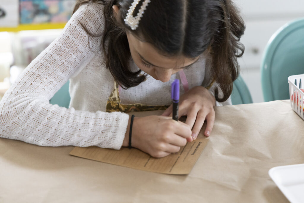 Tween girls participating in confidence-building workshop
